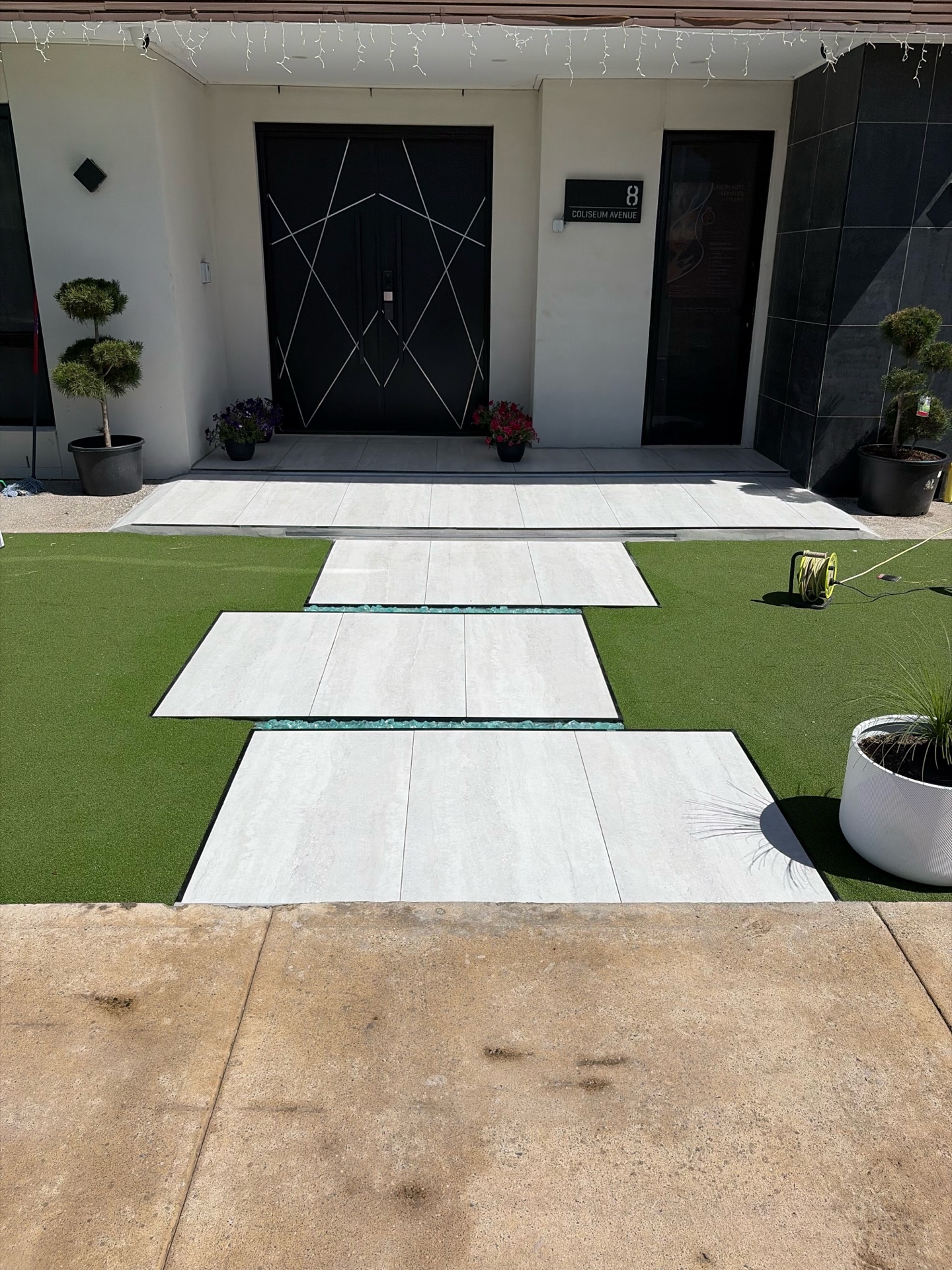 Travertine tiling and artificial grass front entry renovation, Melbourne northern suburbs